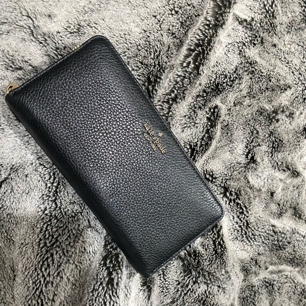 A White Kate Spade Purse with black wallet. - Picture 2 of 2